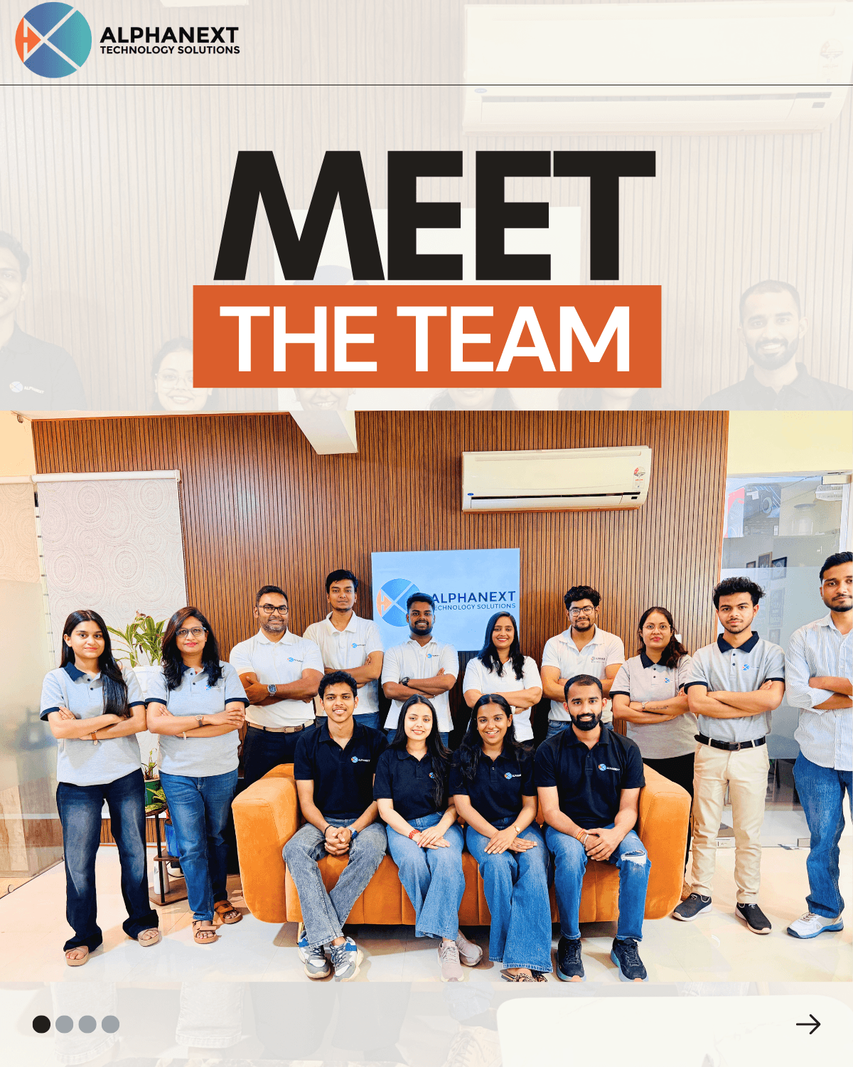 The AlphaNext Team Alpha collective posing together for a group photo in the office